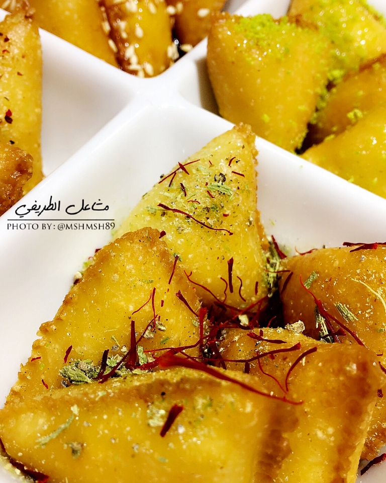 http://www.encyclopediacooking.com/food-recipes-photos/arabic-food-cooking-recipes-in-arabic-triangles-semolina-mashael-al-tarifi2.jpg