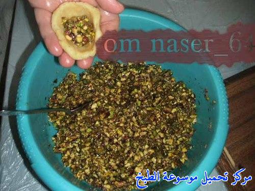 http://www.encyclopediacooking.com/upload_recipes_online/uploads/images_maamoul-recipe-in-arabic-%D9%85%D8%B9%D9%85%D9%88%D9%84-%D8%A8%D8%A7%D9%84%D8%AA%D9%85%D8%B1-%D9%88%D8%A7%D9%84%D9%81%D8%B3%D8%AA%D9%82-%D8%A7%D9%84%D8%AD%D9%84%D8%A8%D9%8A-%D9%88%D8%A7%D9%84%D8%AC%D9%88%D8%B220.jpg
